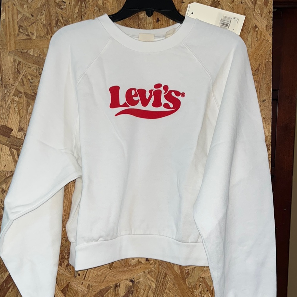 BRAND NEW!!! Womens cropped top Levi’s crew sweatshirt. Size med.